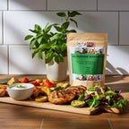Spice n Easy All Purpose seasoning pouch beside roasted vegetables and grilled meat on a serving board