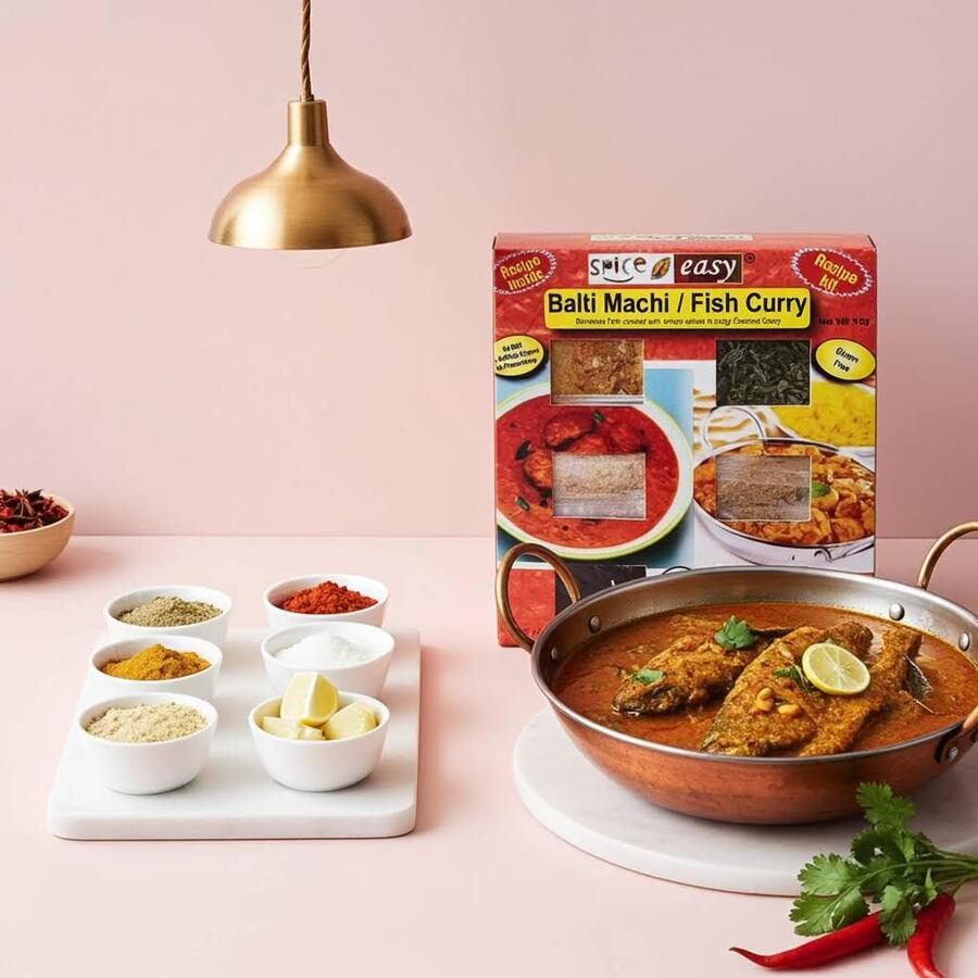 SpicenEasy fish curry recipe kit packaging showing branded spice sachets and a bowl of fish curry