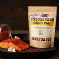Spice n Easy Cajun rub pouch standing upright on a dark background