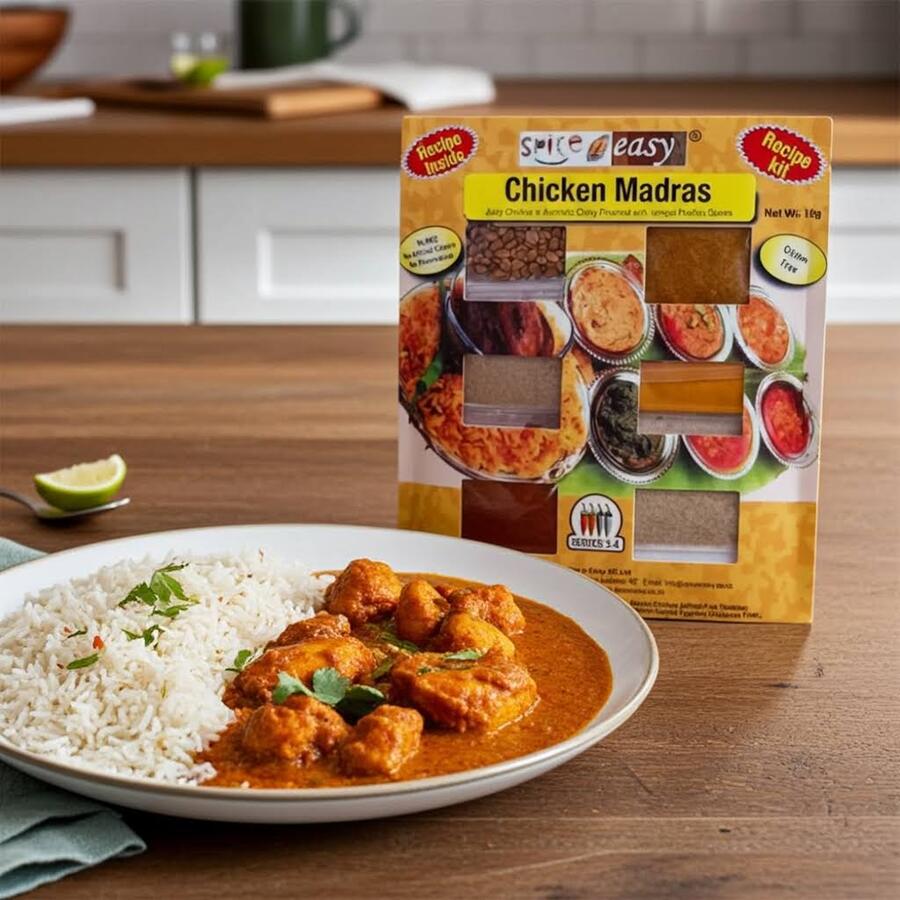 SpicenEasy chicken madras recipe kit packaging showing spice sachets and rich red curry