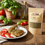 Spice n Easy Italian Herb seasoning pouch beside pasta with tomato-based sauce