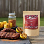 Spice n Easy Smokey BBQ seasoning pouch standing upright on a dark surface